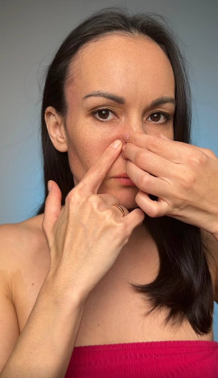 Marina demonstrating a facial technique